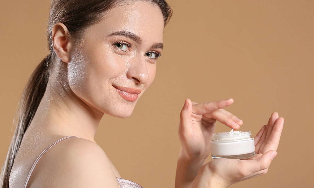 Skincare product being applied, representing cosmetics manufacturing